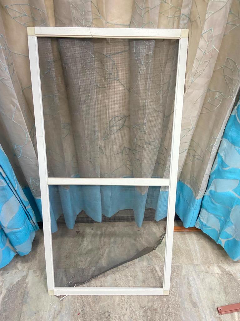 White-framed mosquito screen panel